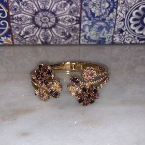 Kate Spade gold and purpler floral hinged bangle